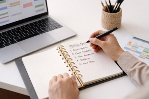 Writing a structured meeting agenda to improve time management in a small business