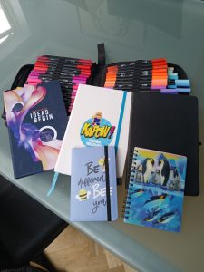 Different notebooks, pens and planning tools showing that people work in different ways