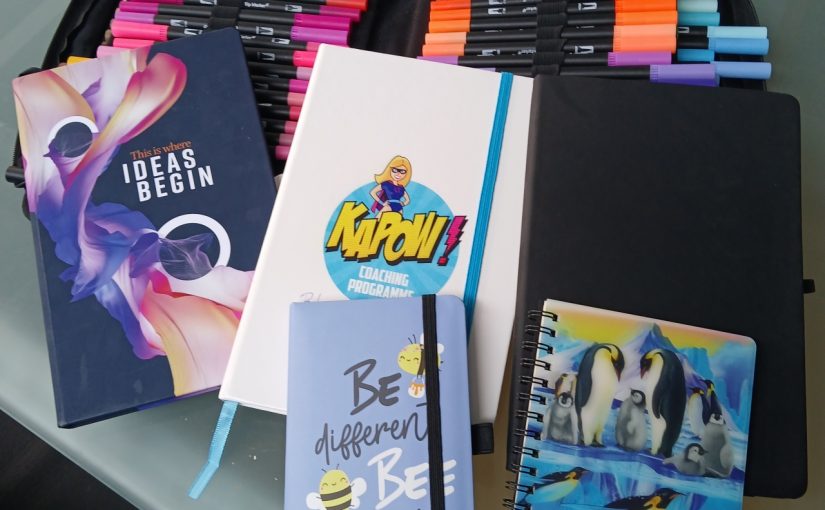 Different notebooks, pens and planning tools showing that people work in different ways